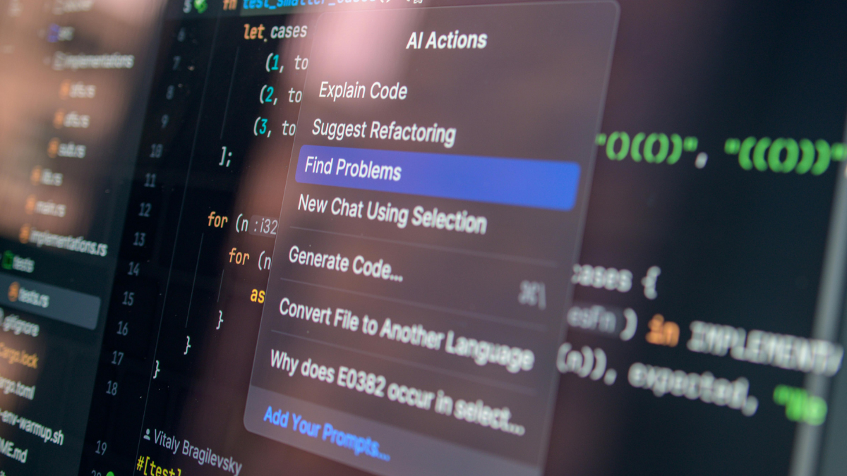 Screen showing programming code and a highlighted context menu with options such as "Find Problems" and "Generate Code"