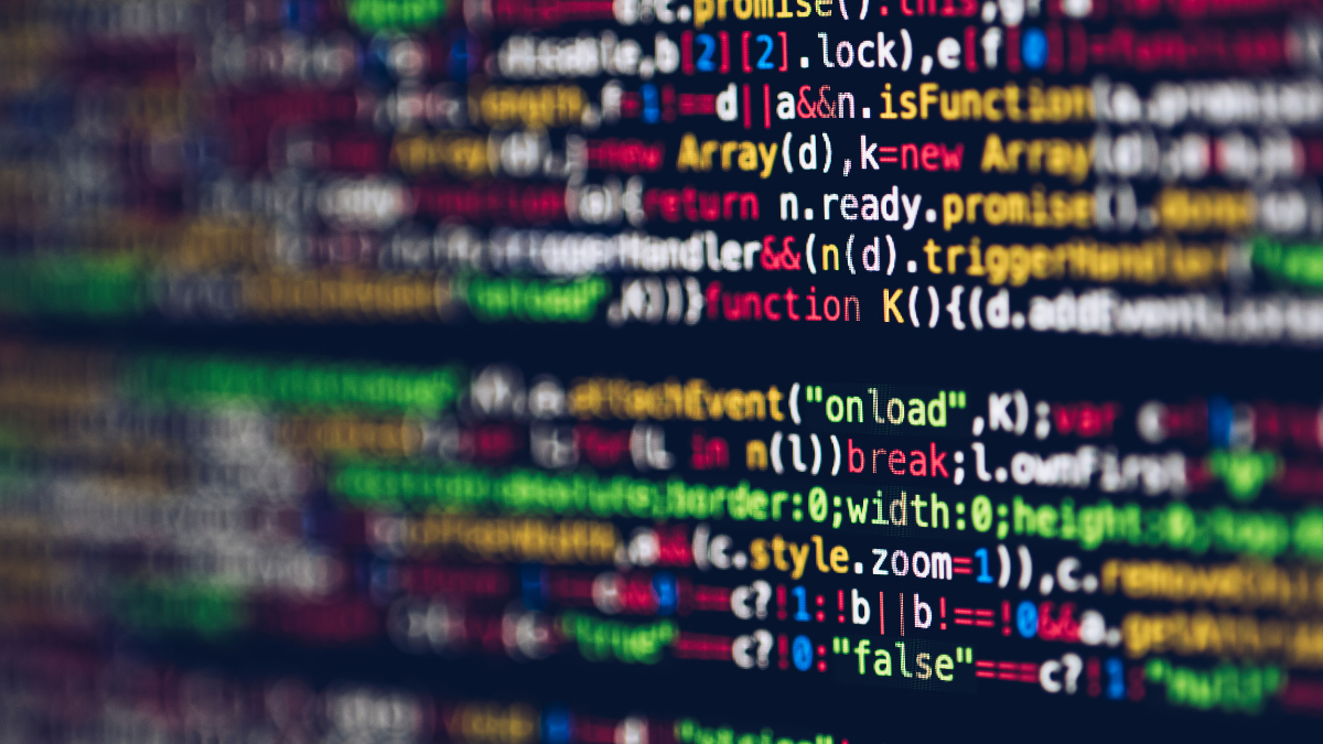 Close-up of colorful programming code on a screen, with highlighted keywords and functions